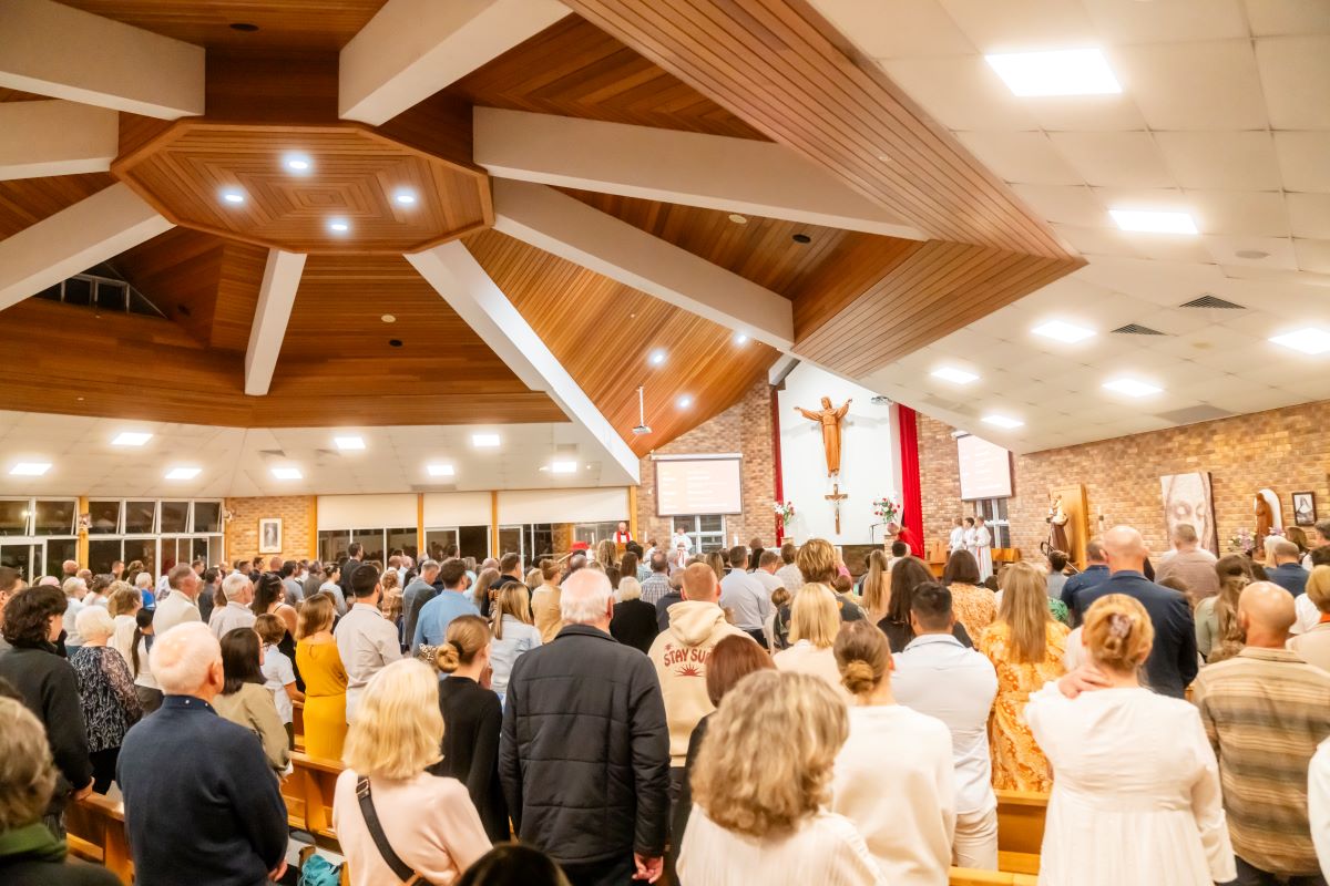 People gathering for mass at St Anthony's church in Kingscliff